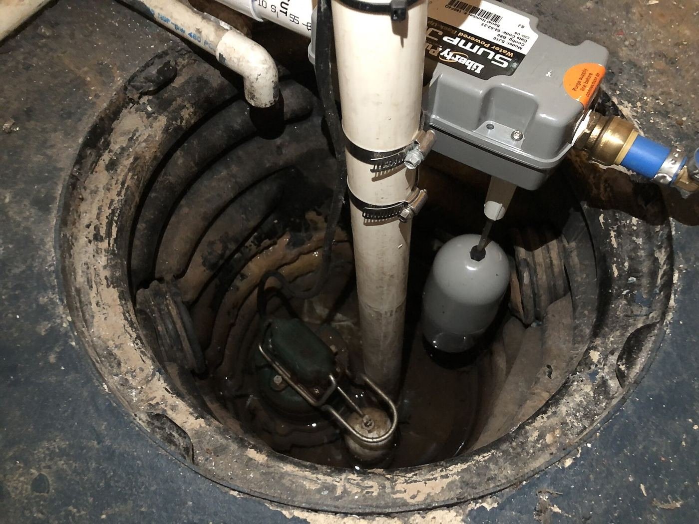 Sump pump in a basement pit